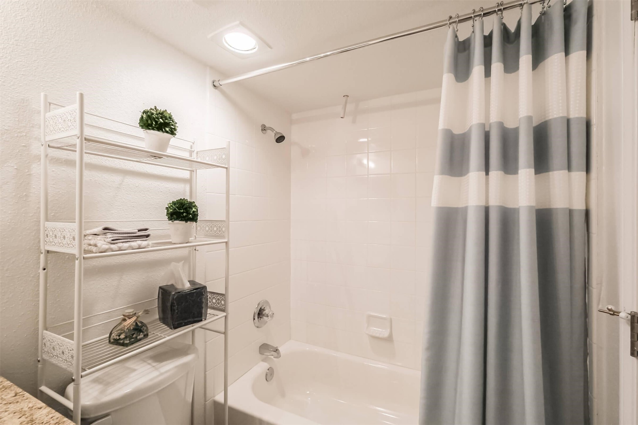 5900 North Braeswood Boulevard, Unit 258 Houston, TX 77074 - Photo 19 of 32 a bathroom with a shower and a sink