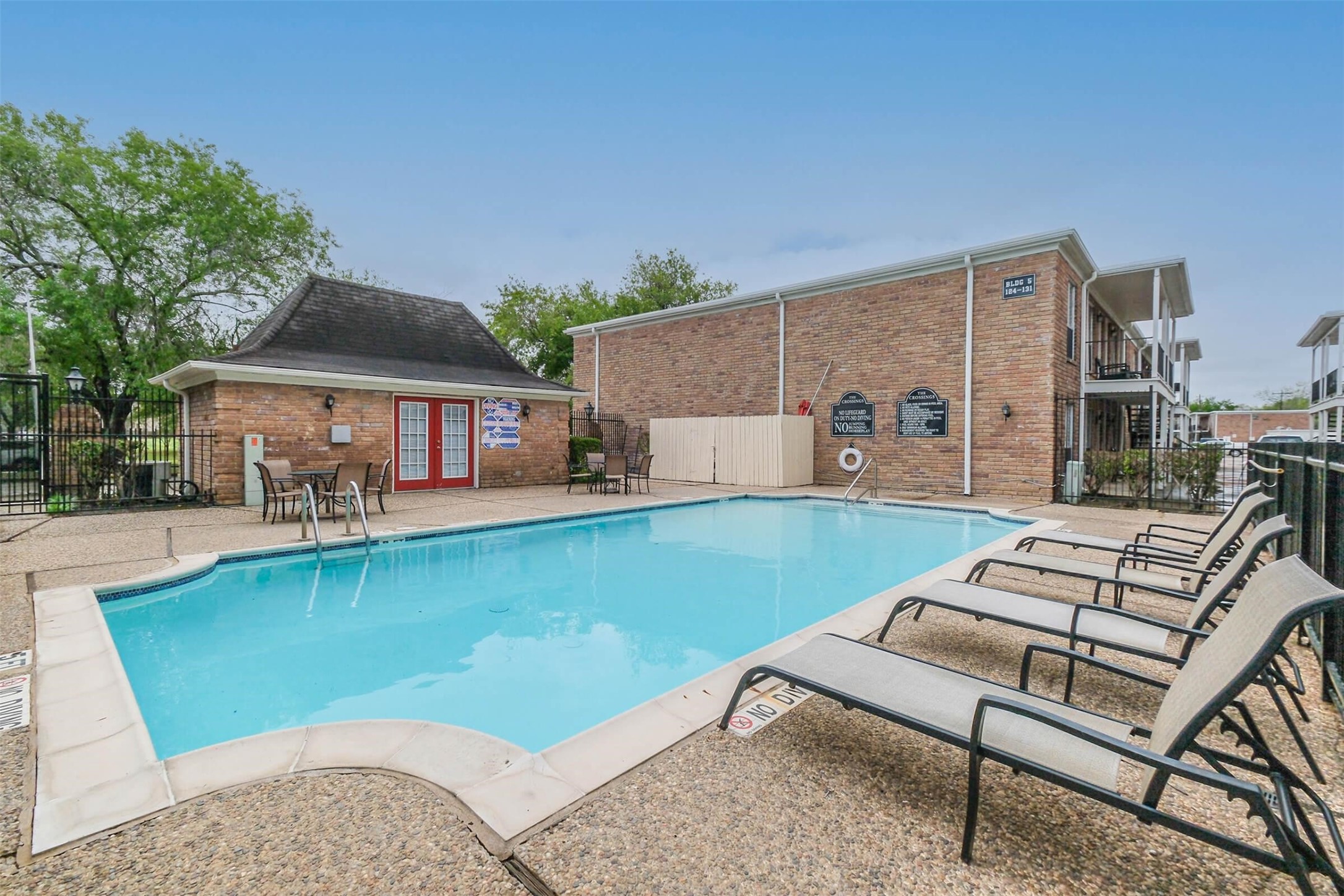 5900 North Braeswood Boulevard, Unit 258 Houston, TX 77074 - Photo 27 of 32 a view of house with swimming pool outdoor seating