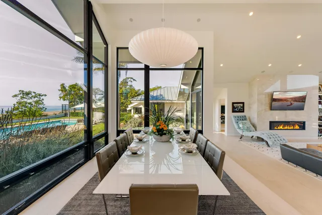 a bedroom with furniture and a flat screen tv