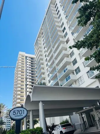 a front view of a building with balcony