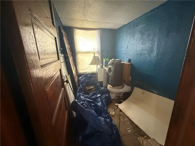 a room with furniture and a window