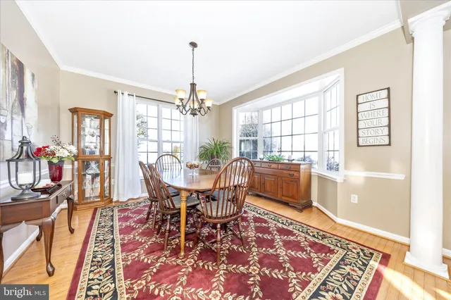 a kitchen with stainless steel appliances granite countertop a sink dishwasher a refrigerator and a stove