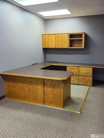 a room with a table and window