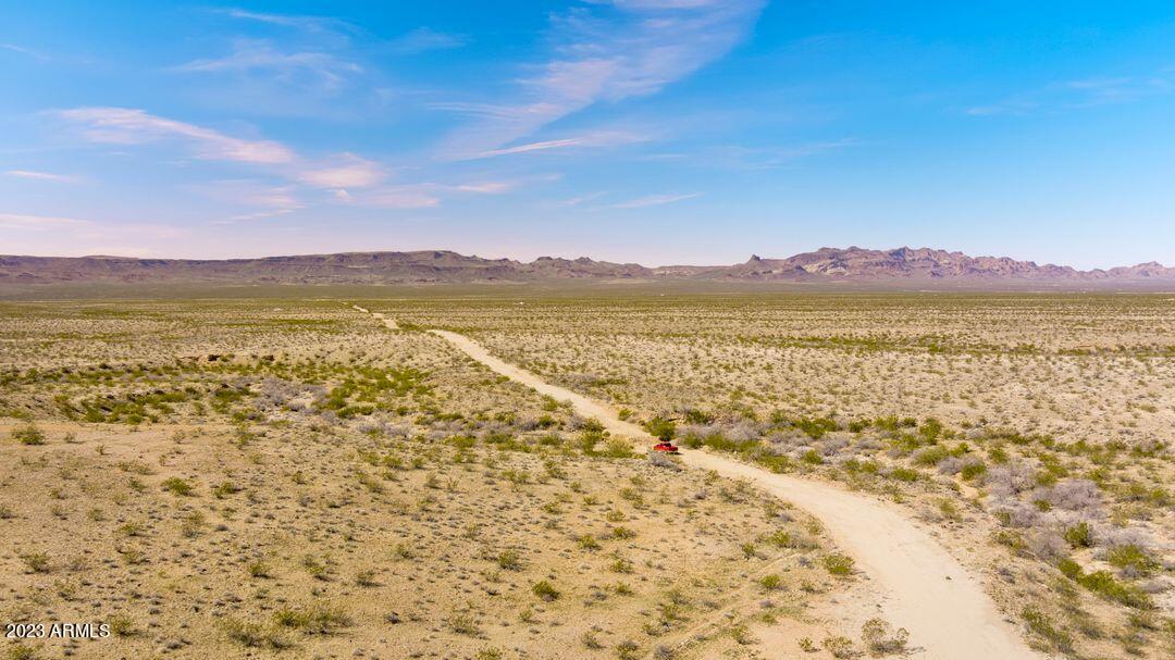 4648 West Sheldon Street, Unit 1 & 2 Golden Valley, AZ 86413 - Photo 7 of 21 a view of an ocean and a mountain
