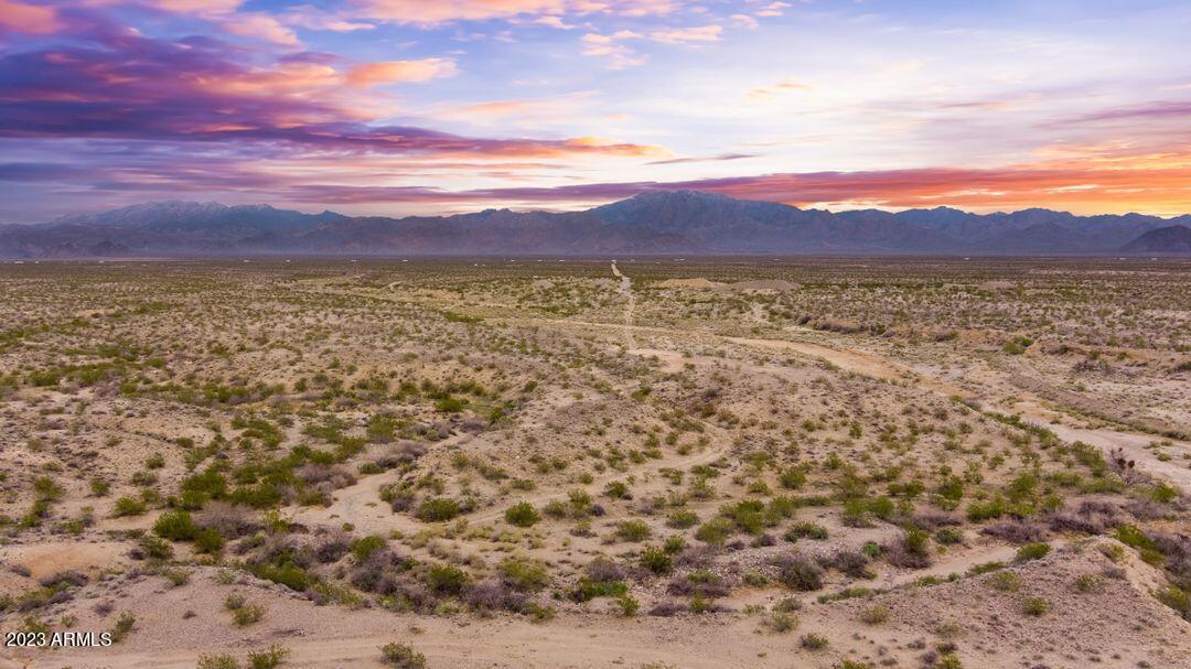 4648 West Sheldon Street, Unit 1 & 2 Golden Valley, AZ 86413 - Photo 8 of 21 a view of an outdoor space and mountain view in back