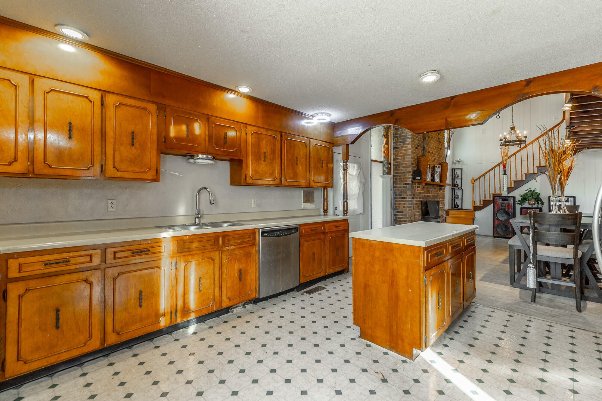 8417 Iris Drive Chattanooga, TN 37421 - Photo 20 of 90 a kitchen with stainless steel appliances a sink and cabinets