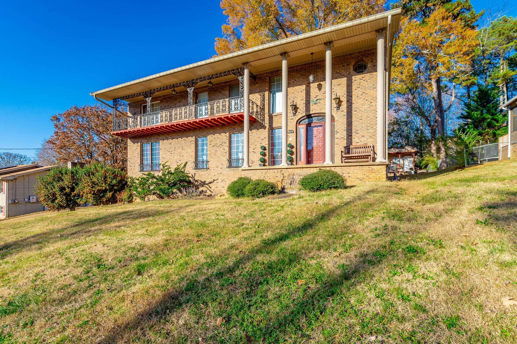 8417 Iris Drive Chattanooga, TN 37421 - Photo 2 of 90 a front view of a house with a yard