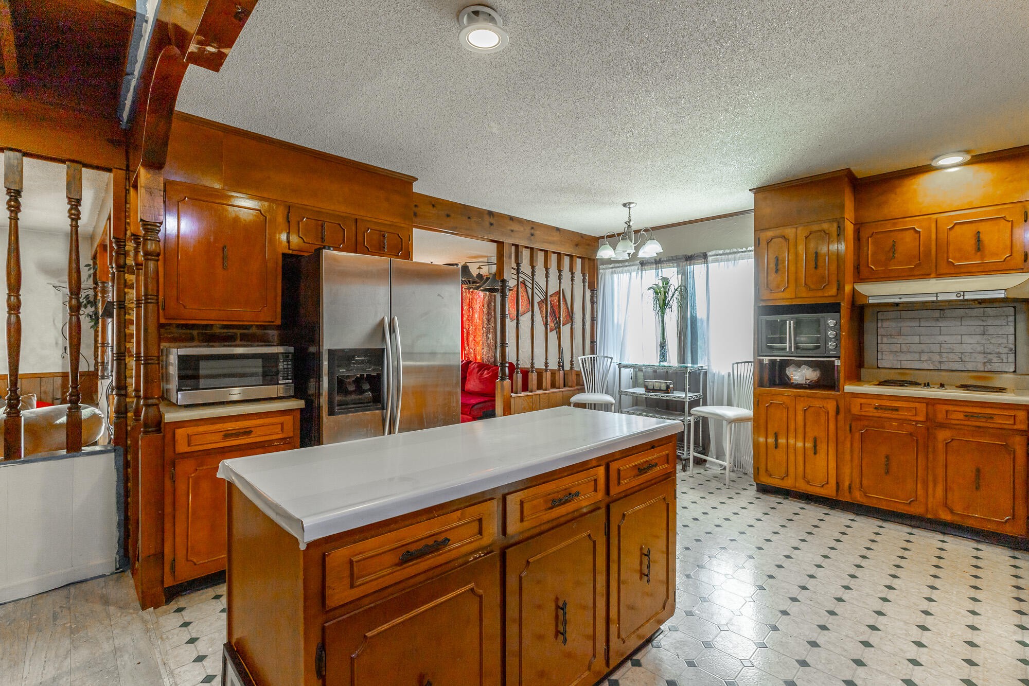 8417 Iris Drive Chattanooga, TN 37421 - Photo 21 of 90 a kitchen with stainless steel appliances a sink and a refrigerator