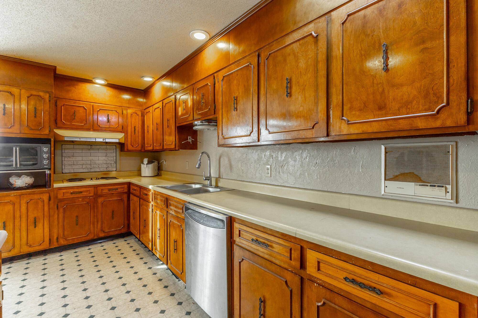 8417 Iris Drive Chattanooga, TN 37421 - Photo 23 of 90 a kitchen with stainless steel appliances granite countertop a sink and cabinets