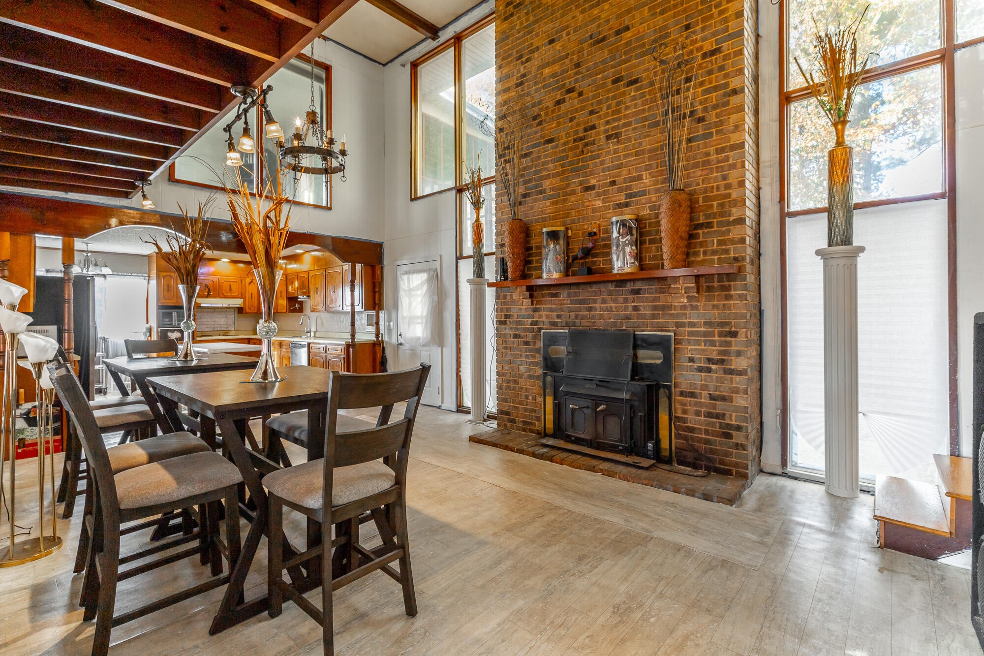8417 Iris Drive Chattanooga, TN 37421 - Photo 27 of 90 a view of a patio with a table and chairs and a fireplace