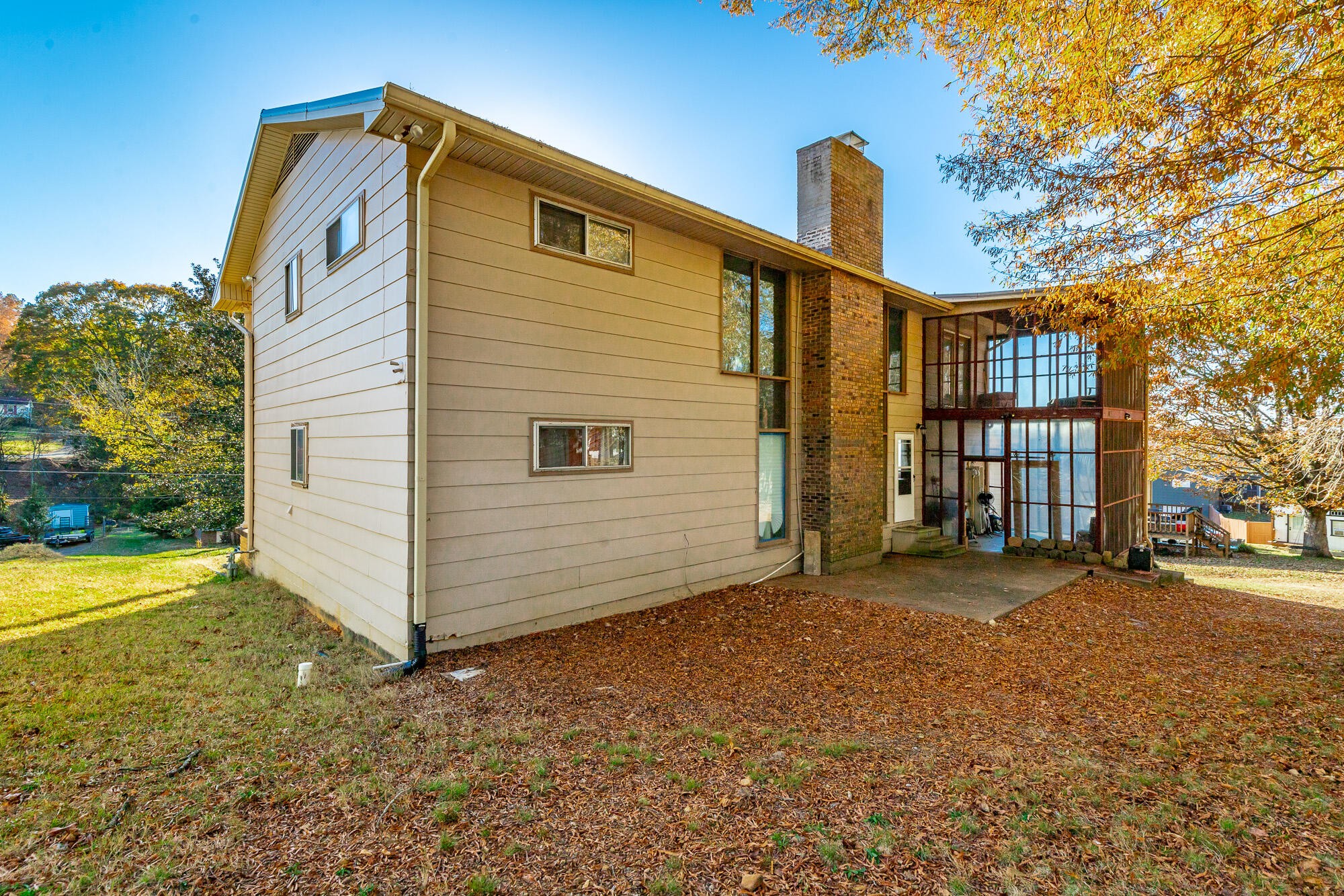 8417 Iris Drive Chattanooga, TN 37421 - Photo 86 of 90 a front view of a house with a yard