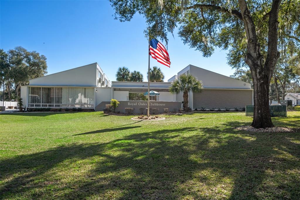 3529 South Belgrave Drive Inverness, FL 34452 - Photo 23 of 35 a front view of a house with a yard