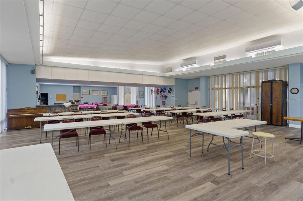 3529 South Belgrave Drive Inverness, FL 34452 - Photo 26 of 35 a room with lots of wooden furniture a table and chairs in it