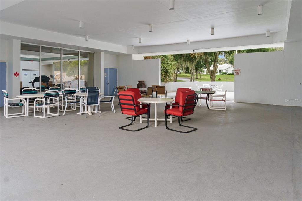 3529 South Belgrave Drive Inverness, FL 34452 - Photo 28 of 35 a view of a big room with furniture window and outside view
