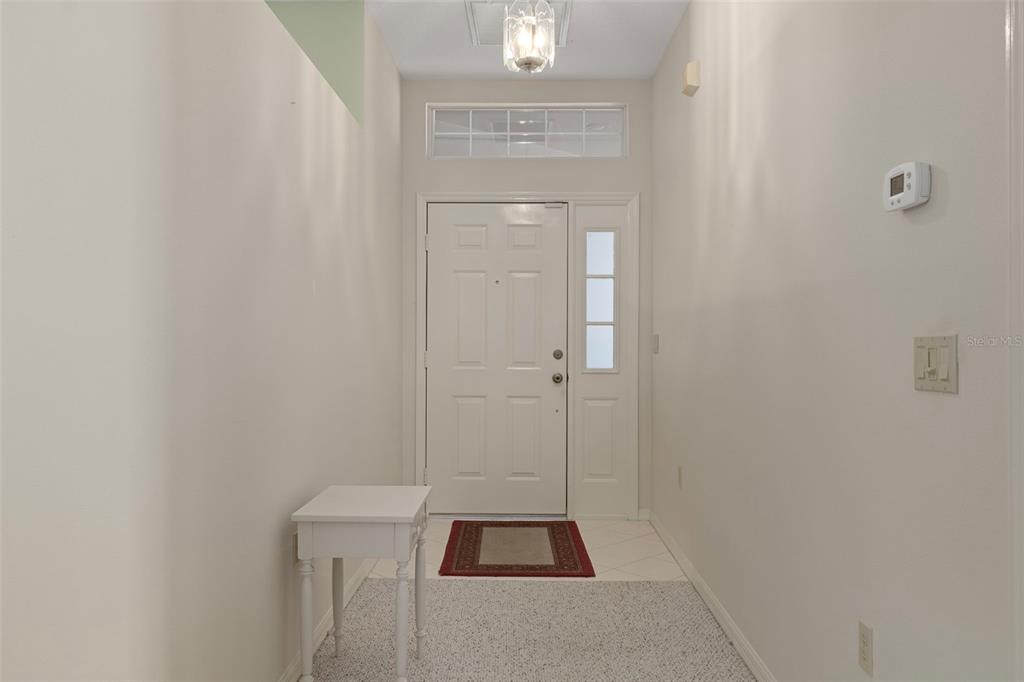 3529 South Belgrave Drive Inverness, FL 34452 - Photo 3 of 35 a bathroom with a sink and a mirror