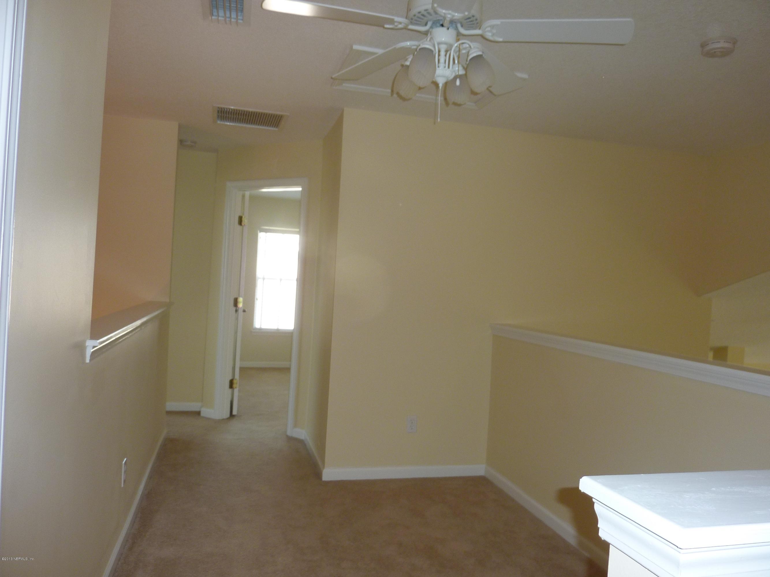 273 Porta Rosa Circle St. Augustine, FL 32092 - Photo 13 of 48 wooden floor in an empty room