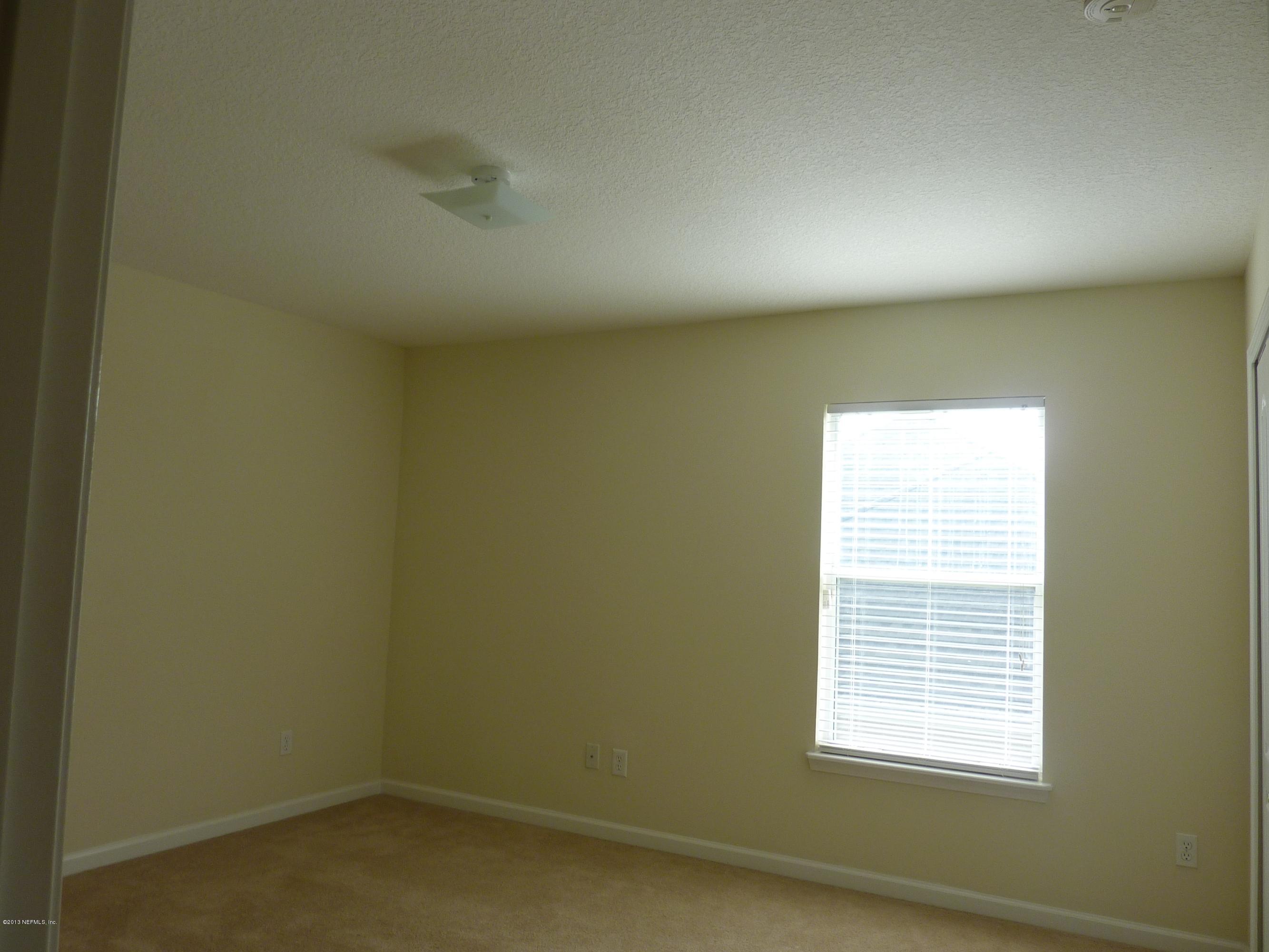 273 Porta Rosa Circle St. Augustine, FL 32092 - Photo 16 of 48 an empty room with a window