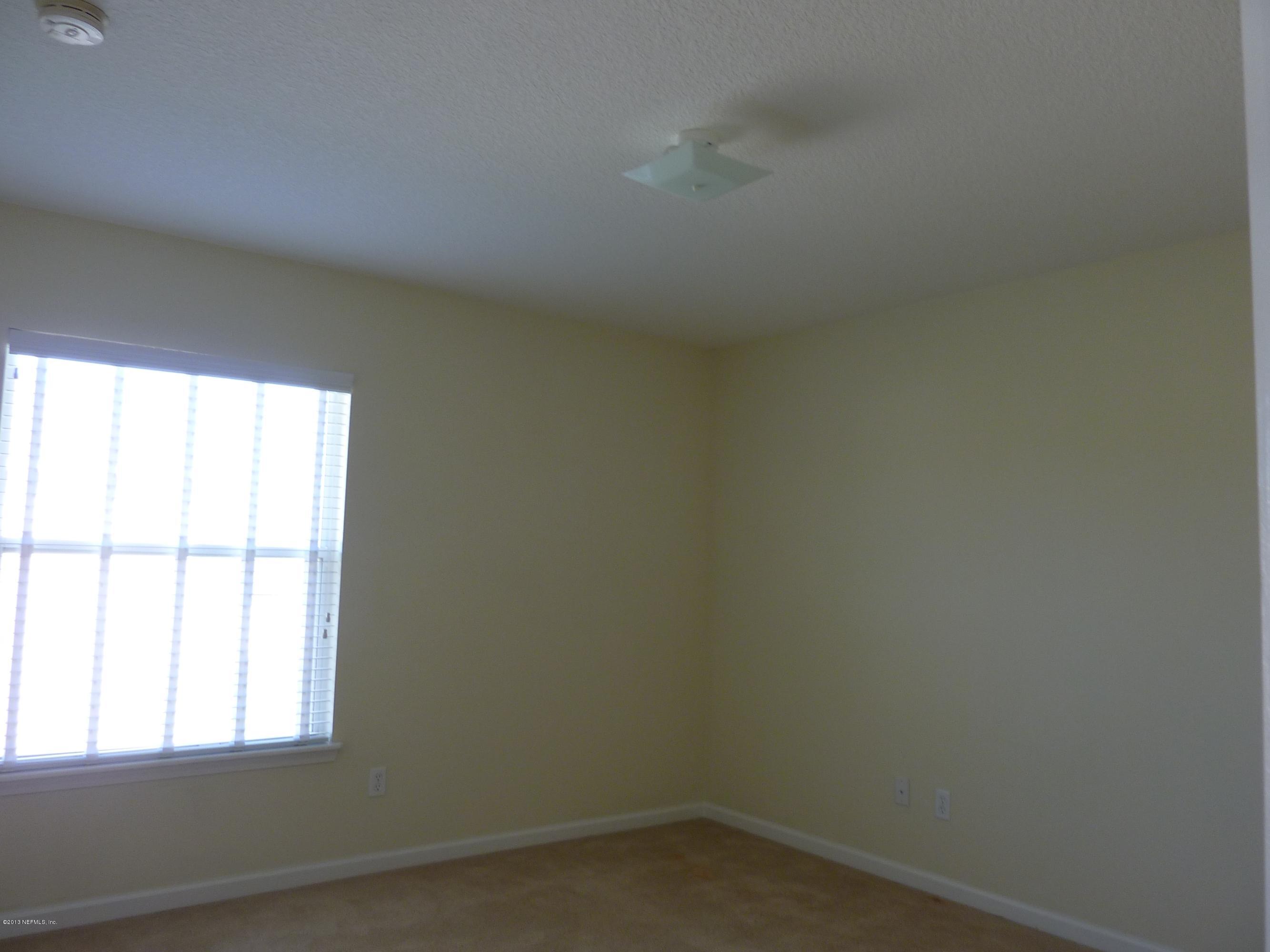 273 Porta Rosa Circle St. Augustine, FL 32092 - Photo 17 of 48 an empty room with a window