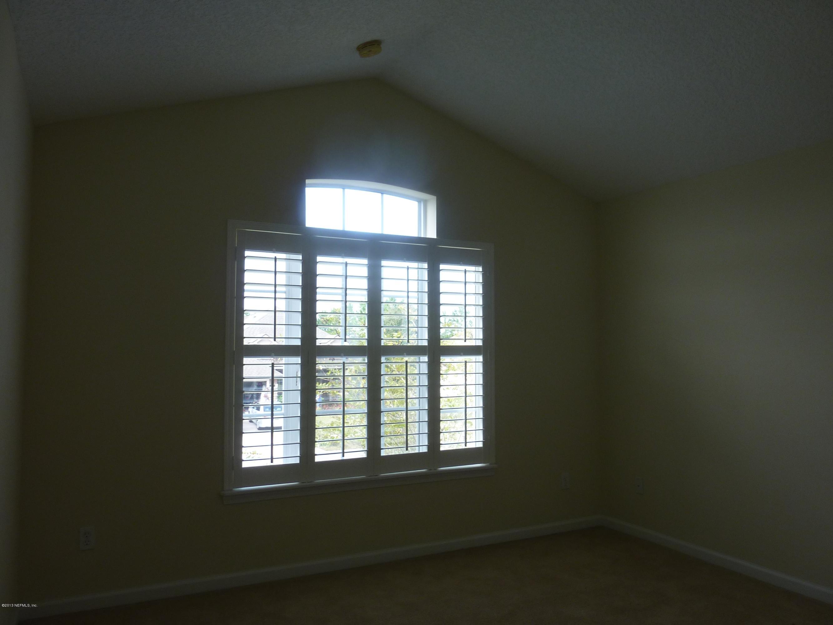 273 Porta Rosa Circle St. Augustine, FL 32092 - Photo 18 of 48 an empty room with a window
