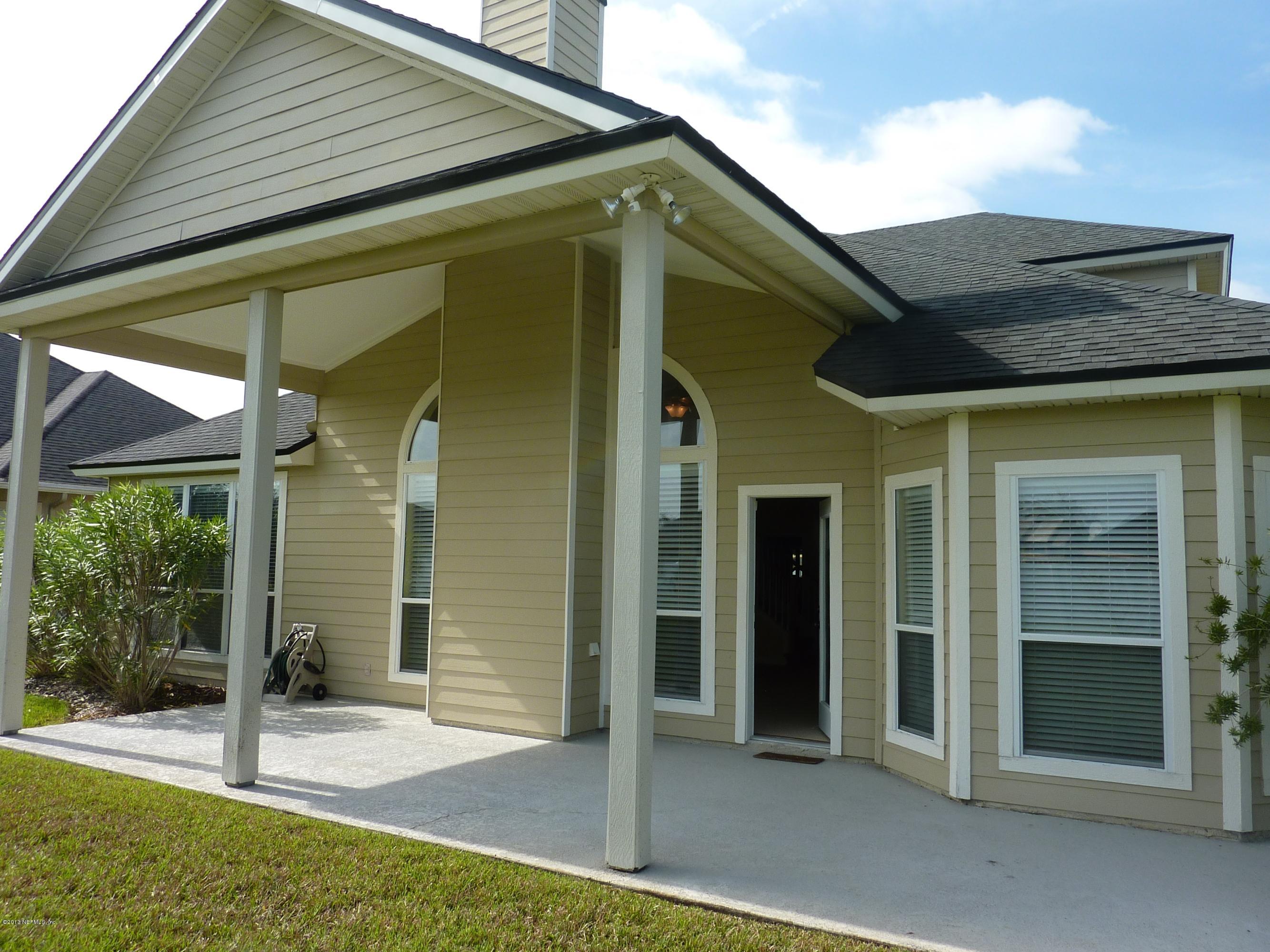 273 Porta Rosa Circle St. Augustine, FL 32092 - Photo 21 of 48 a view of a house with a porch