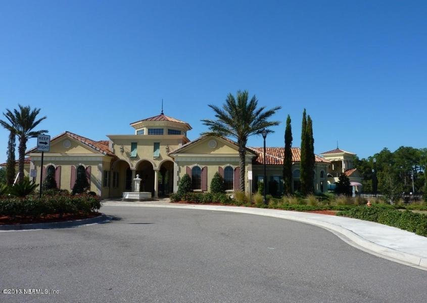 273 Porta Rosa Circle St. Augustine, FL 32092 - Photo 28 of 48 a front view of a building with palm trees