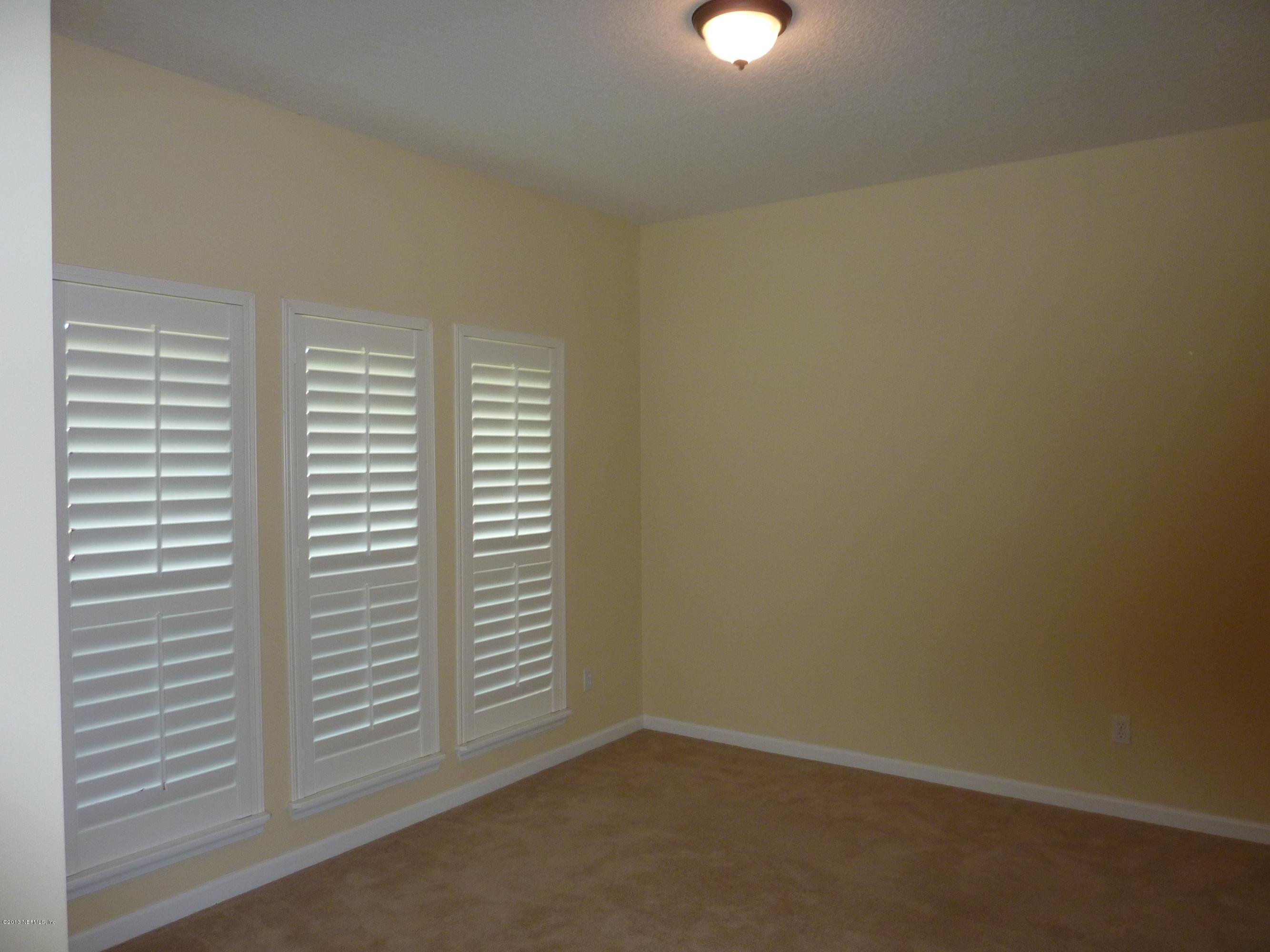 273 Porta Rosa Circle St. Augustine, FL 32092 - Photo 5 of 48 an empty room with a window
