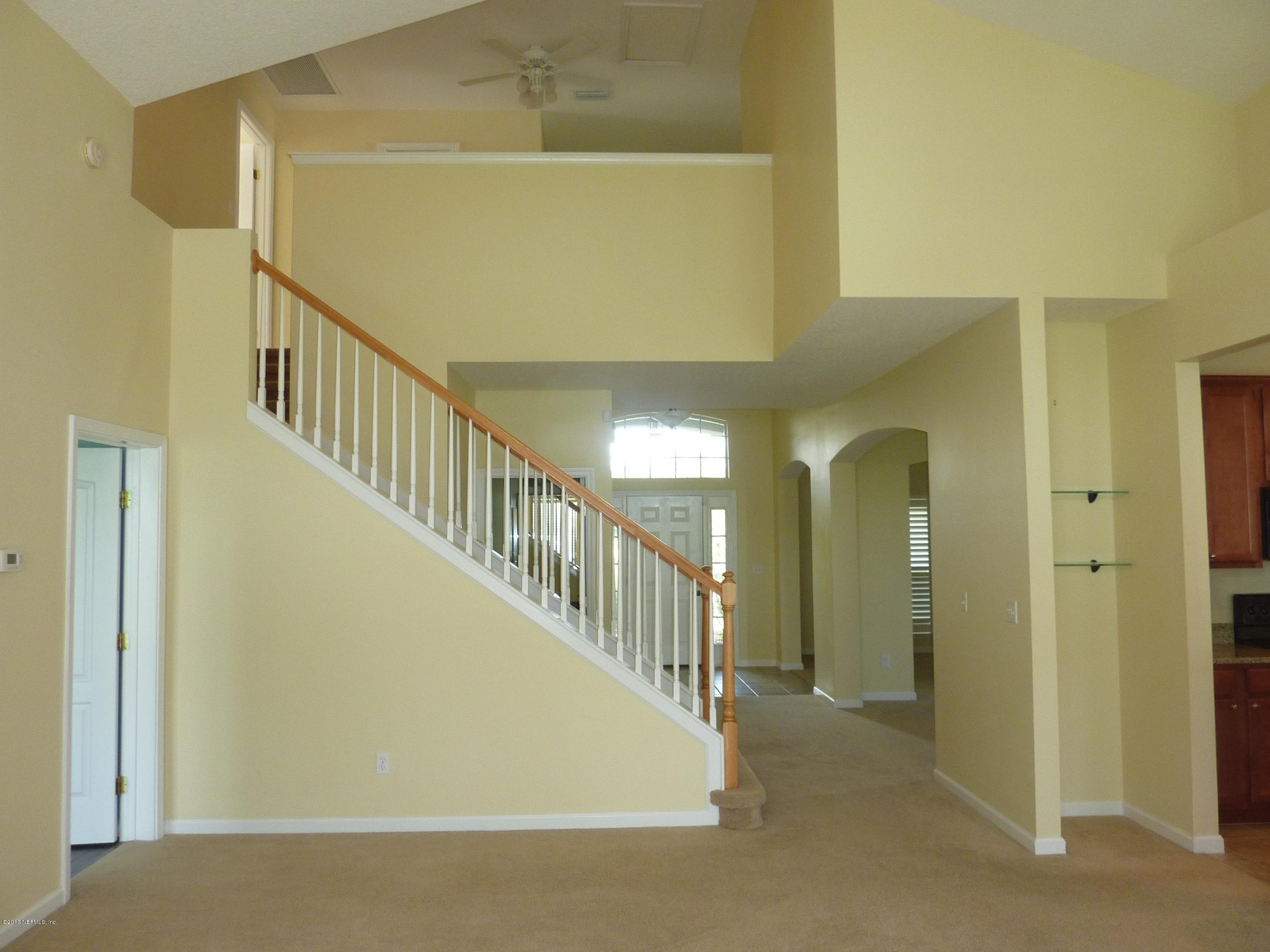 273 Porta Rosa Circle St. Augustine, FL 32092 - Photo 8 of 48 a view of a hallway with staircase