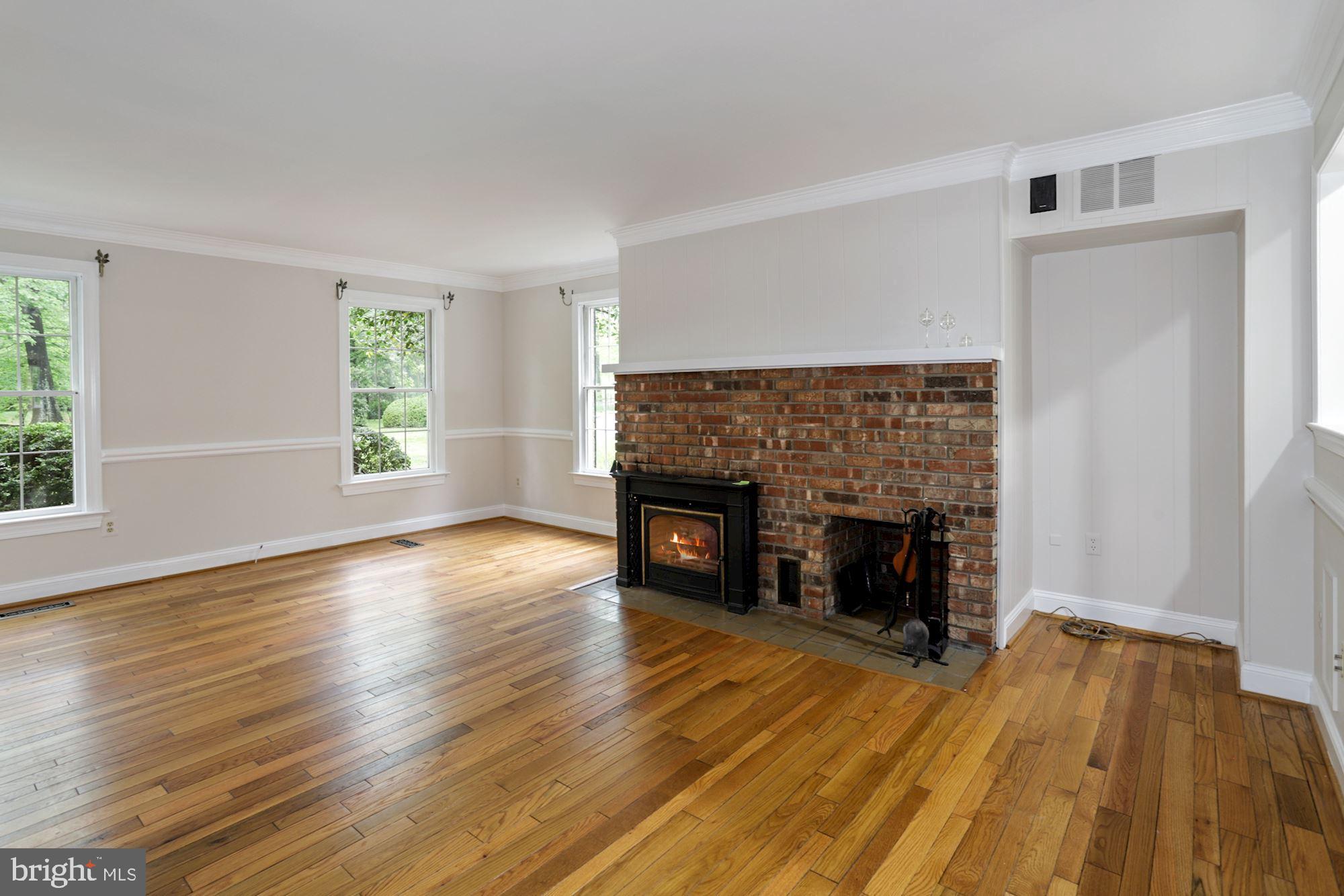 301 Pine Road Fort Washington, MD 20744 - Photo 12 of 55 Main level family room,,wood burning insert