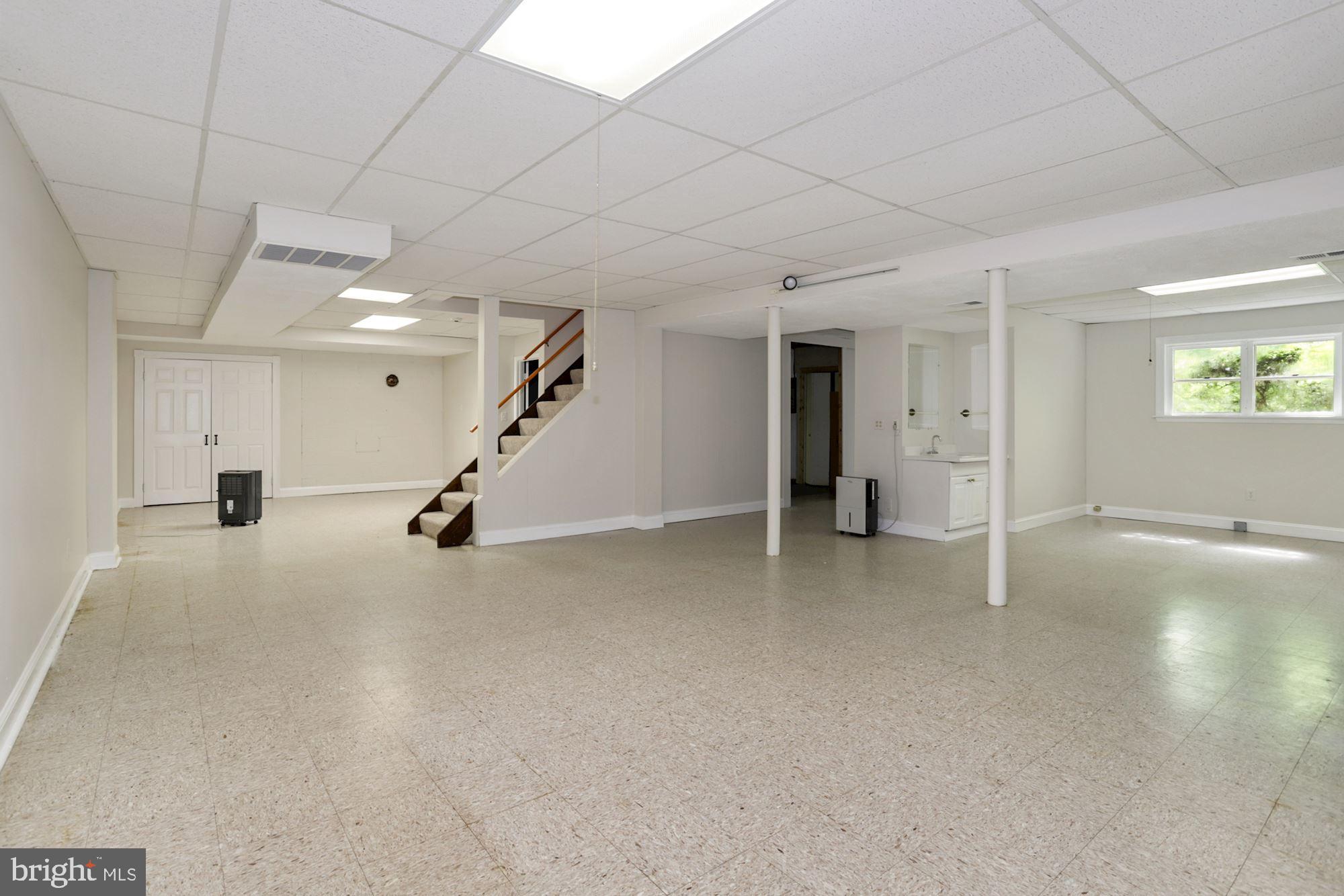 301 Pine Road Fort Washington, MD 20744 - Photo 44 of 55 Lower level recreation room