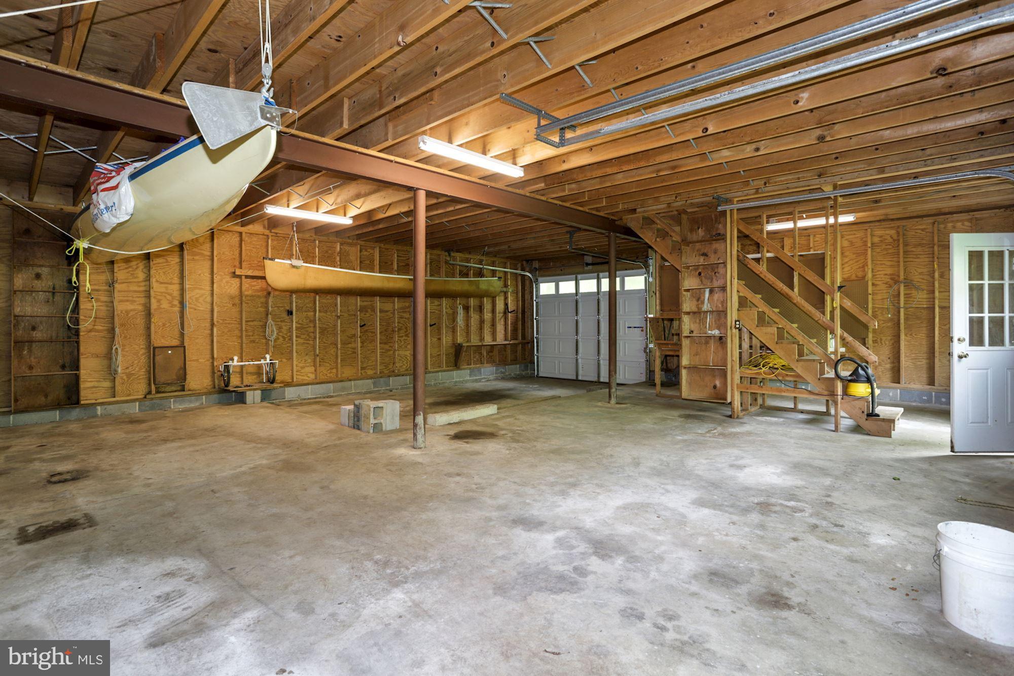 301 Pine Road Fort Washington, MD 20744 - Photo 48 of 55 Inside barn and stairs to left