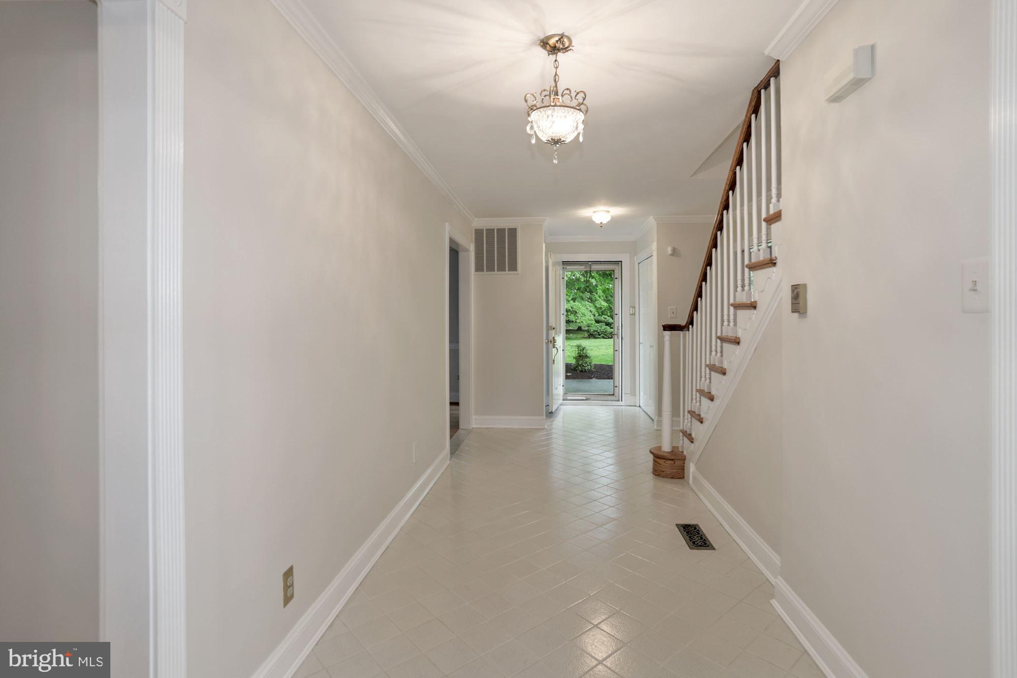 301 Pine Road Fort Washington, MD 20744 - Photo 7 of 55 Foyer from back of home to front door