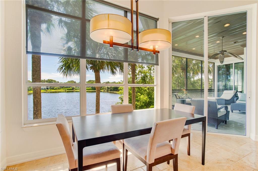 15547 Monterosso Lane, Unit 201 Naples, FL 34110 - Photo 3 of 50 a view of a dining room with furniture window and outside view