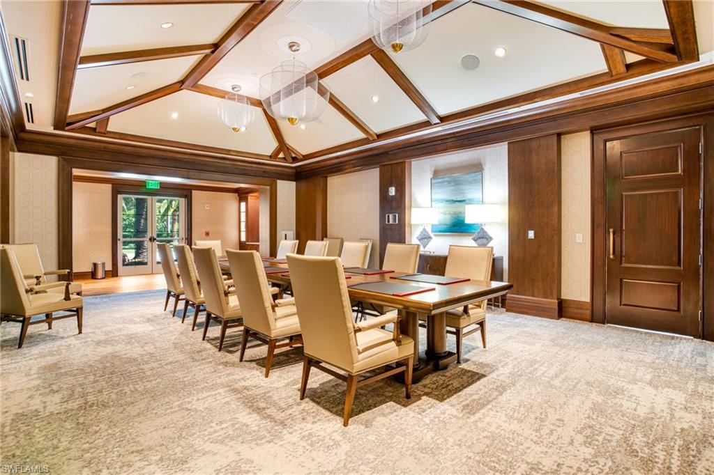 15547 Monterosso Lane, Unit 201 Naples, FL 34110 - Photo 39 of 50 a view of a dining room with furniture window and outside view