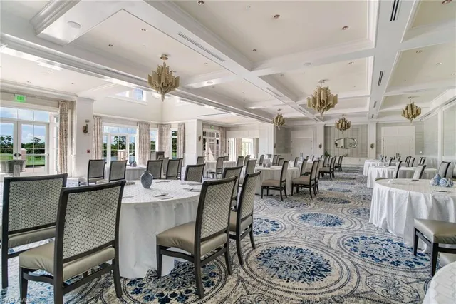 an aerial view of a house with a lake view