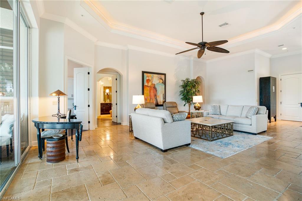 15547 Monterosso Lane, Unit 201 Naples, FL 34110 - Photo 9 of 50 a living room with furniture