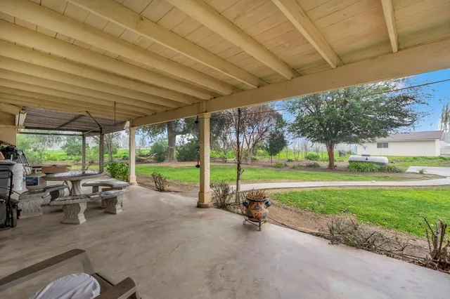 a view of a golf course with a big yard