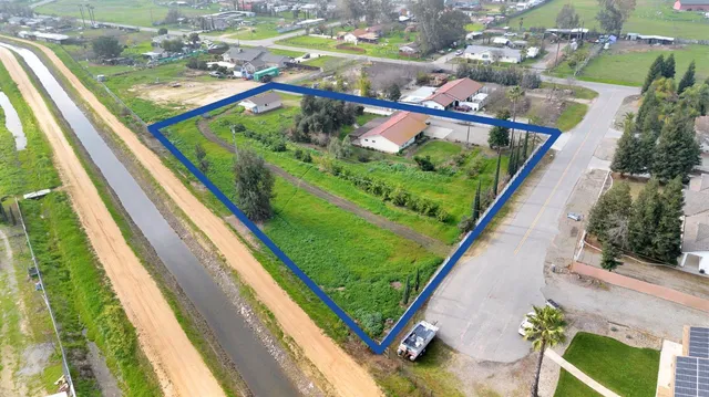 a view of swimming pool with a yard