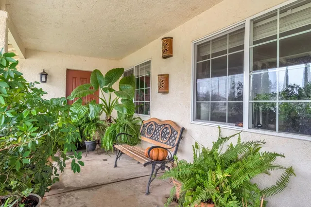 a house with garden in front of it