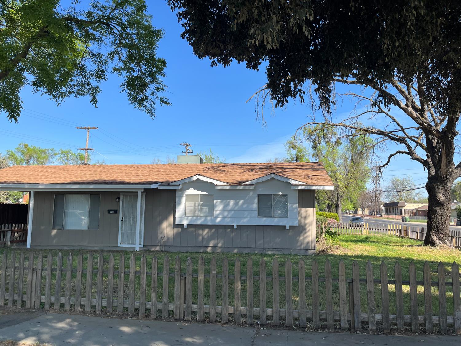 1501 Pelton Avenue Modesto, CA 95351 - Photo 1 of 1 a front view of a house with a yard