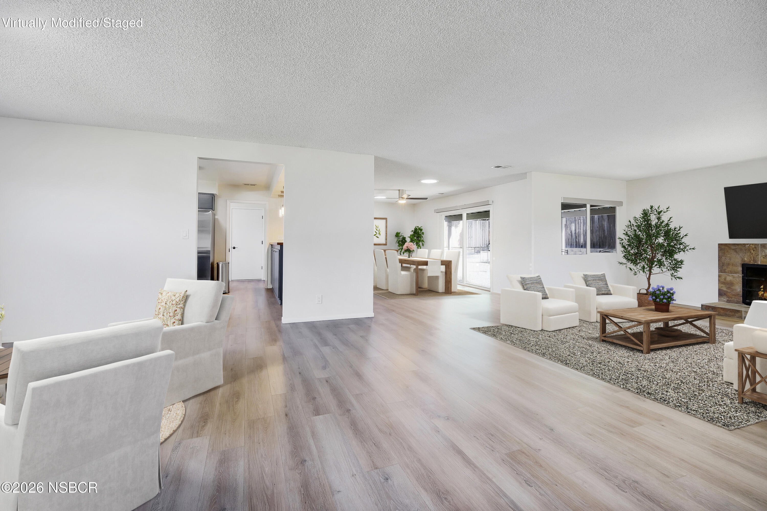 484 Kendale Road Buellton, CA 93427 - Photo 2 of 27 LIVING ROOM AND FAMILY ROOM VS