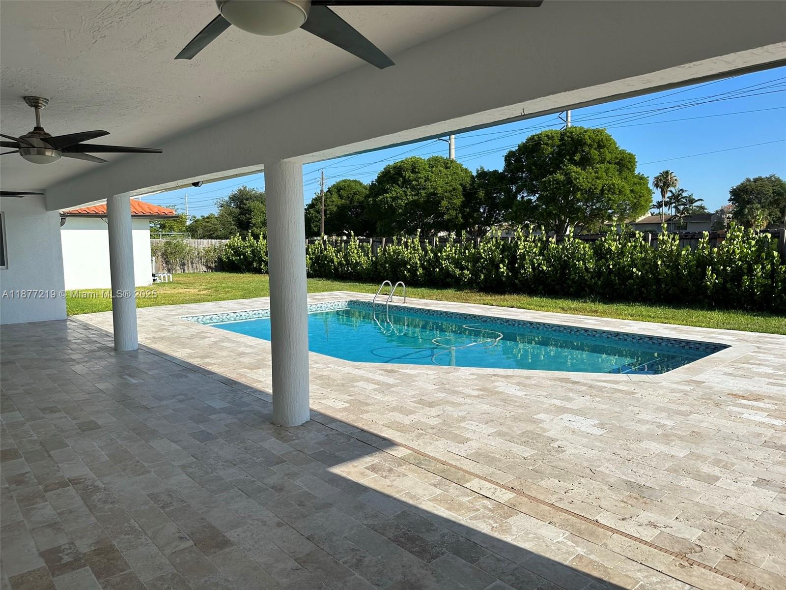 9203 Southwest 136th Terrace Miami, FL 33176 - Photo 17 of 22 a view of a backyard