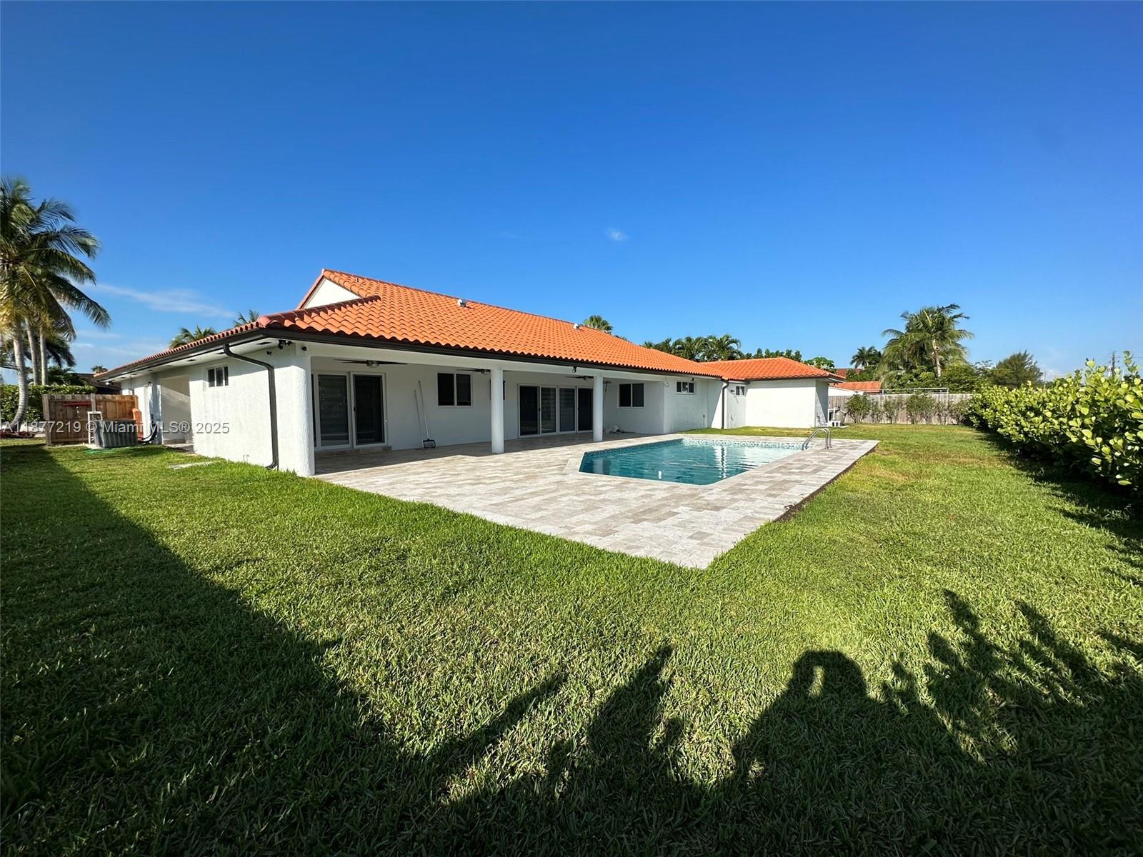 9203 Southwest 136th Terrace Miami, FL 33176 - Photo 19 of 22 a view of house with garden