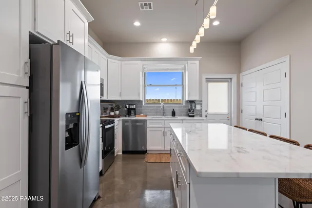 $795,000 | 117 Firethorn Drive, Youngsville, LA 70592