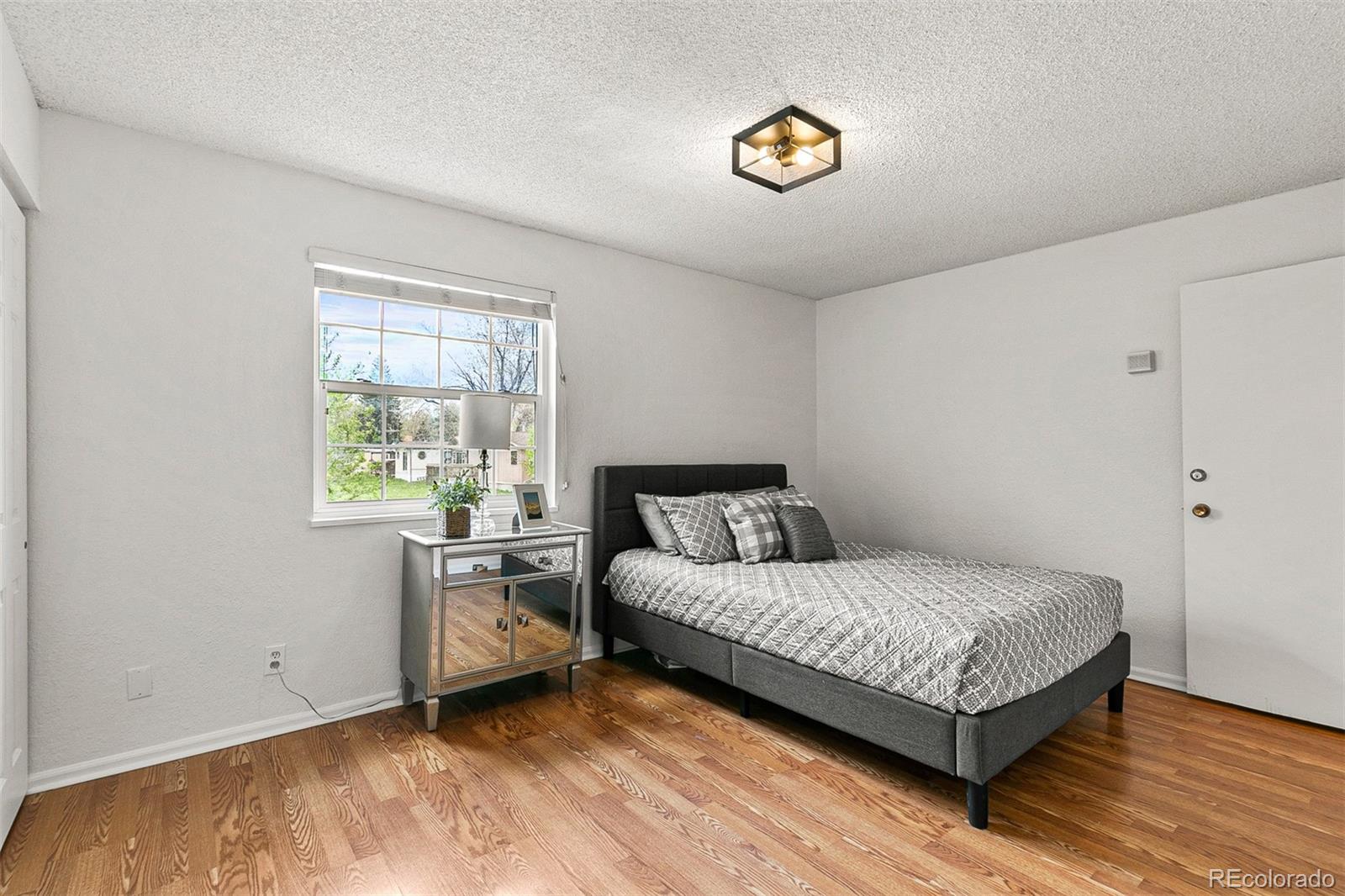 3250 Oneal Circle, Unit 17 Boulder, CO 80301 - Photo 17 of 29 a bedroom with a bed and a window