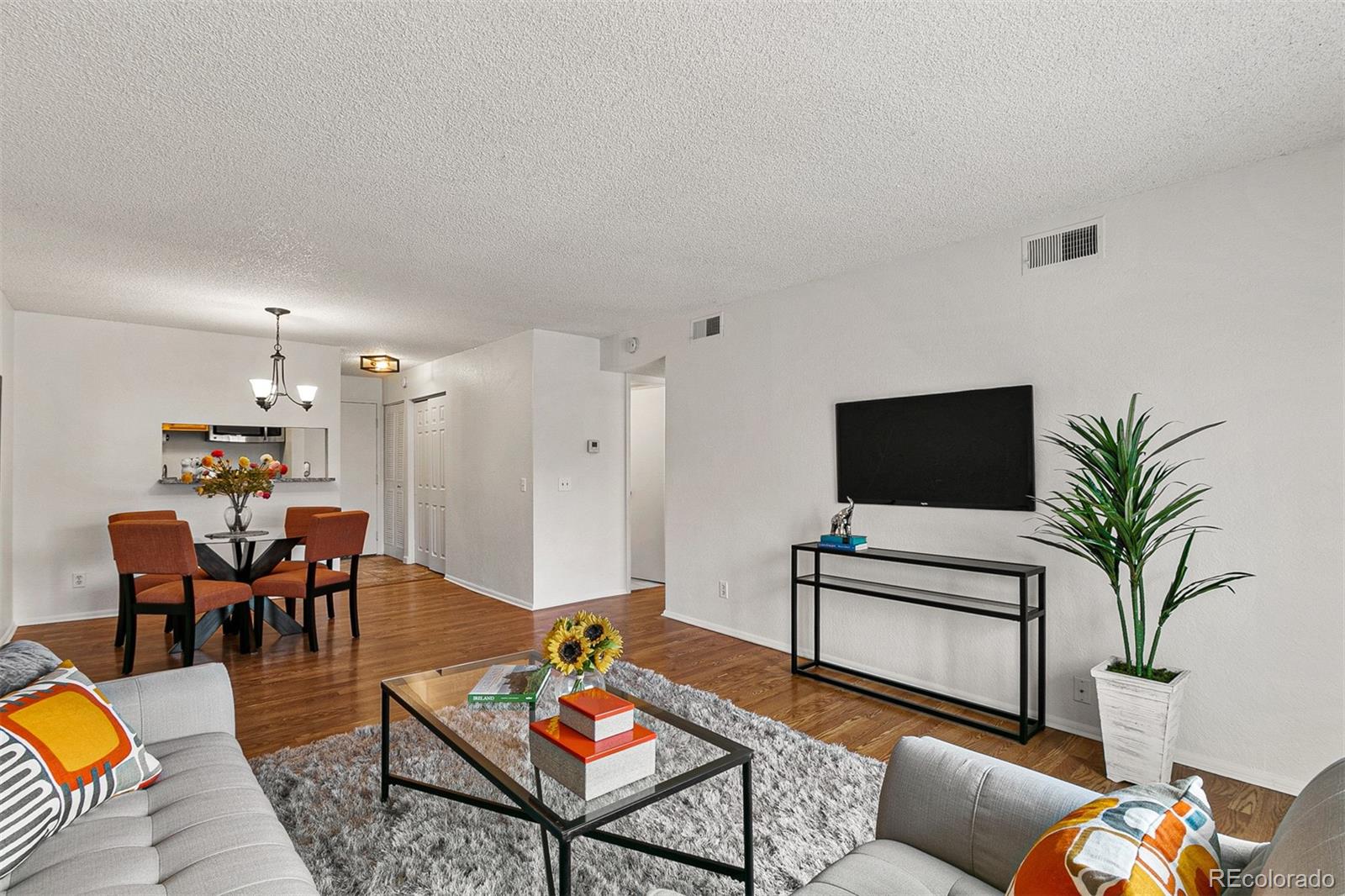 3250 Oneal Circle, Unit 17 Boulder, CO 80301 - Photo 8 of 29 a living room with furniture and a flat screen tv