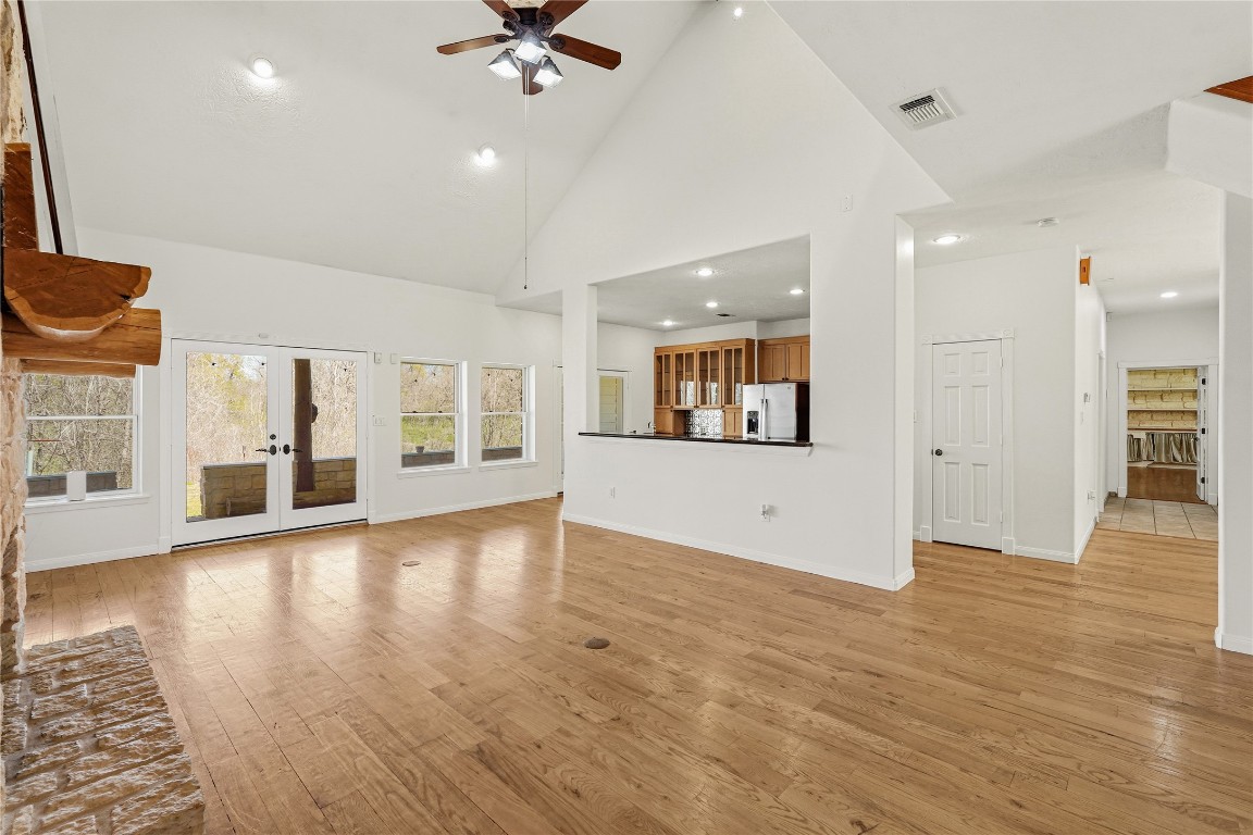 41712 Harpers Church Road Hempstead, TX 77445 - Photo 19 of 50 an empty room with wooden floor and windows
