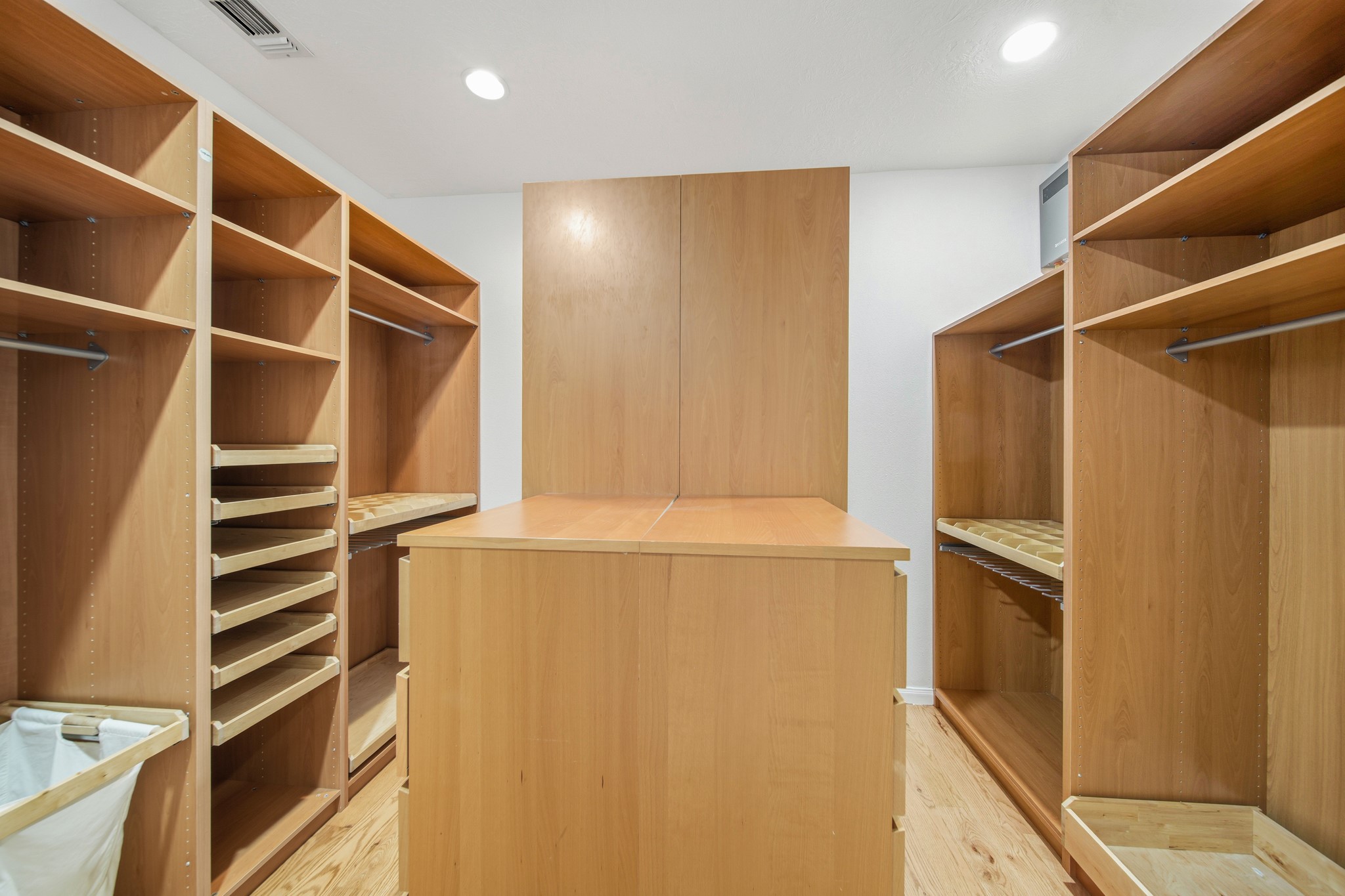 41712 Harpers Church Road Hempstead, TX 77445 - Photo 28 of 50 Huge seasonal closet w/ custom shelving and drawers in Primary Suite