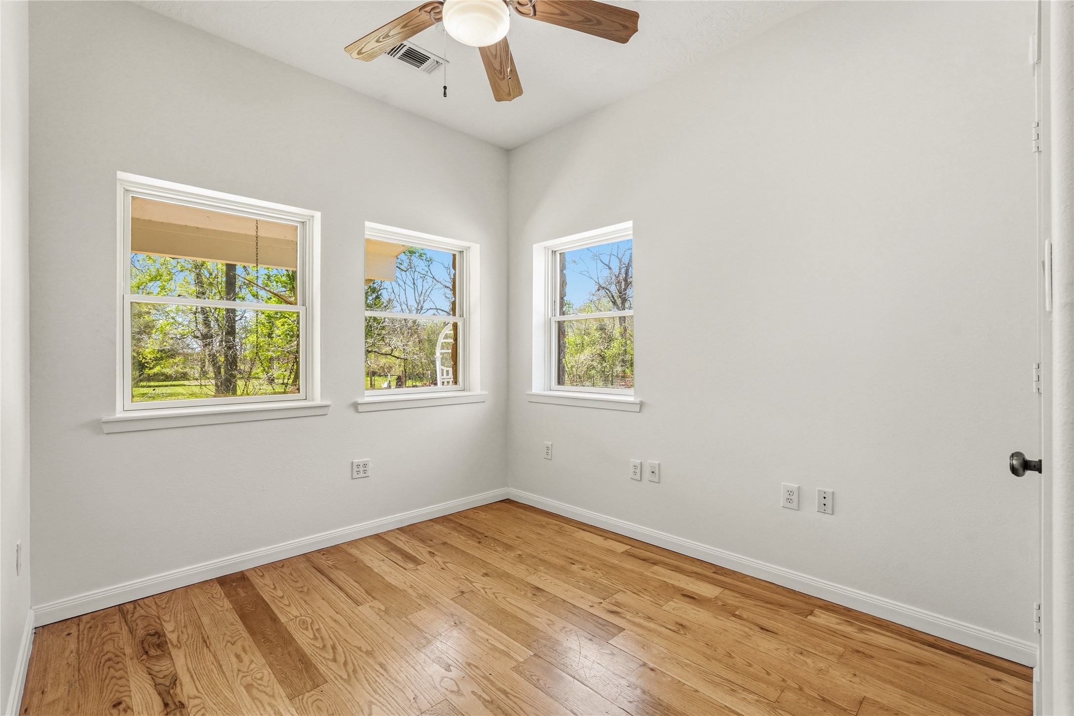 41712 Harpers Church Road Hempstead, TX 77445 - Photo 35 of 50 Flex/Bedroom,nursery,work out room by Primary. Tree views and wooden flooring