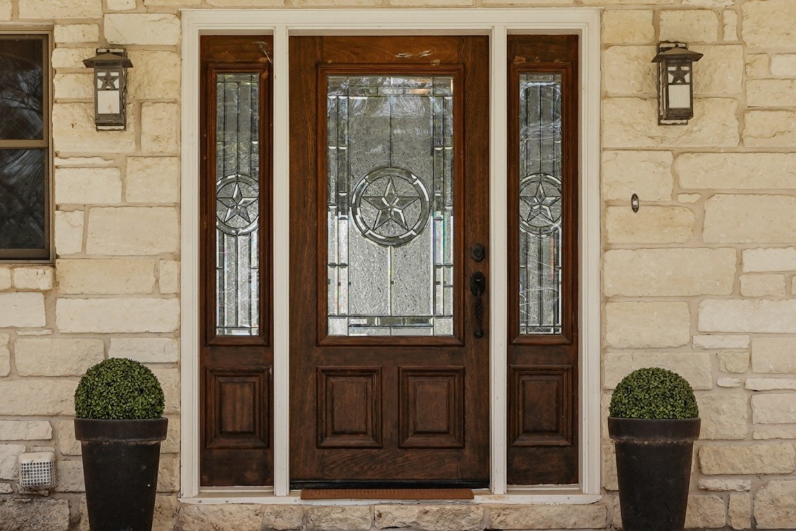 41712 Harpers Church Road Hempstead, TX 77445 - Photo 7 of 50 Beautiful Texas Themed entry, Austin stone, leaded glass door, 10x60 front porch
