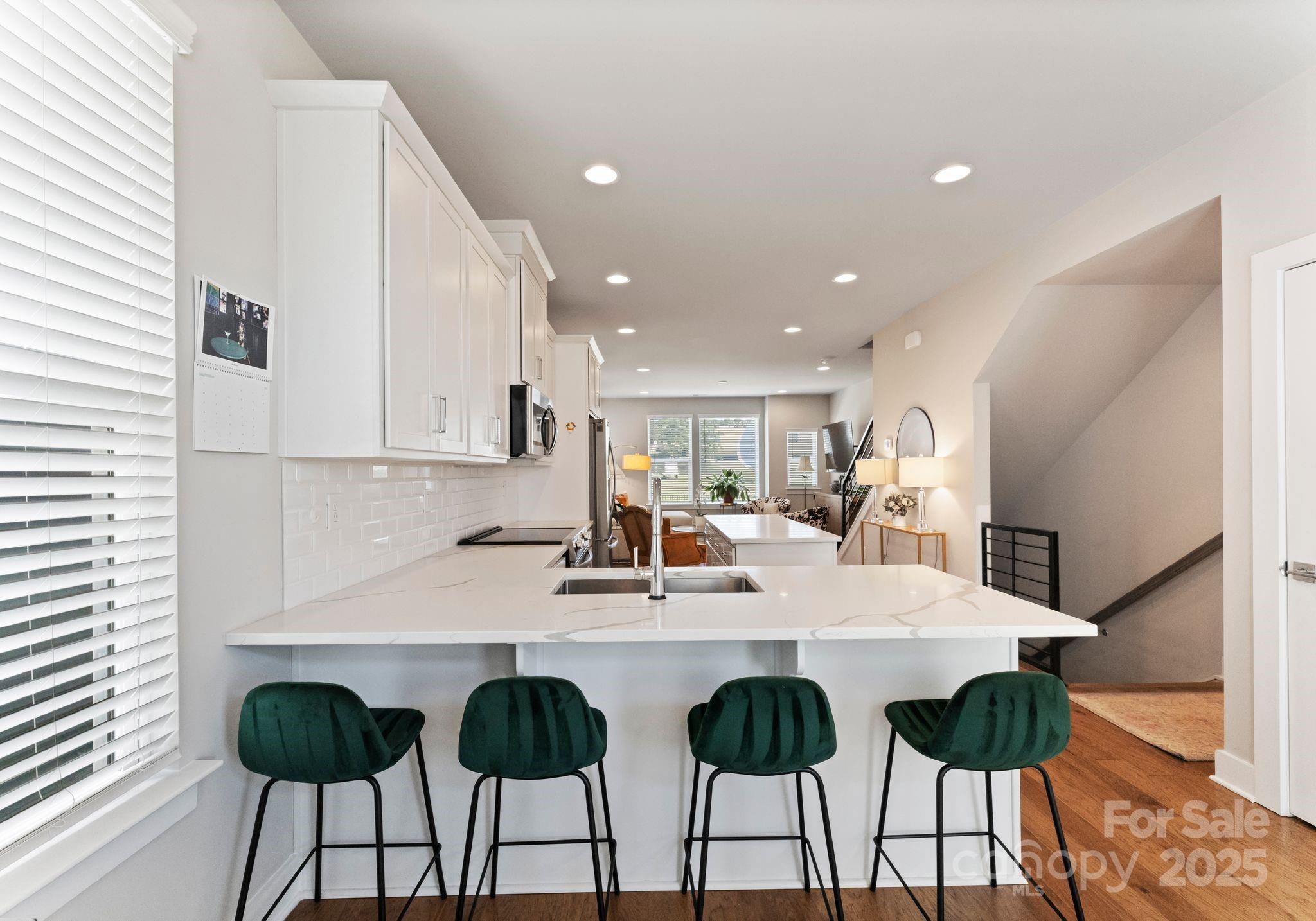 2111 Isom Street Charlotte, NC 28208 - Photo 14 of 36 a view of kitchen with dining area